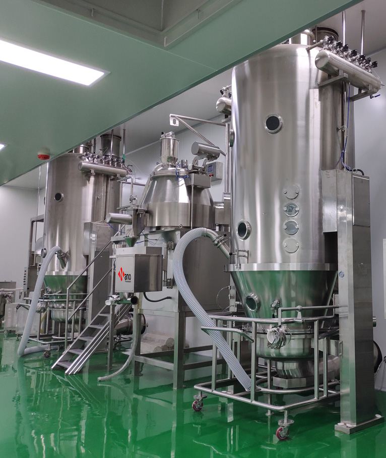 Granulation area with fluid bed processing equipment